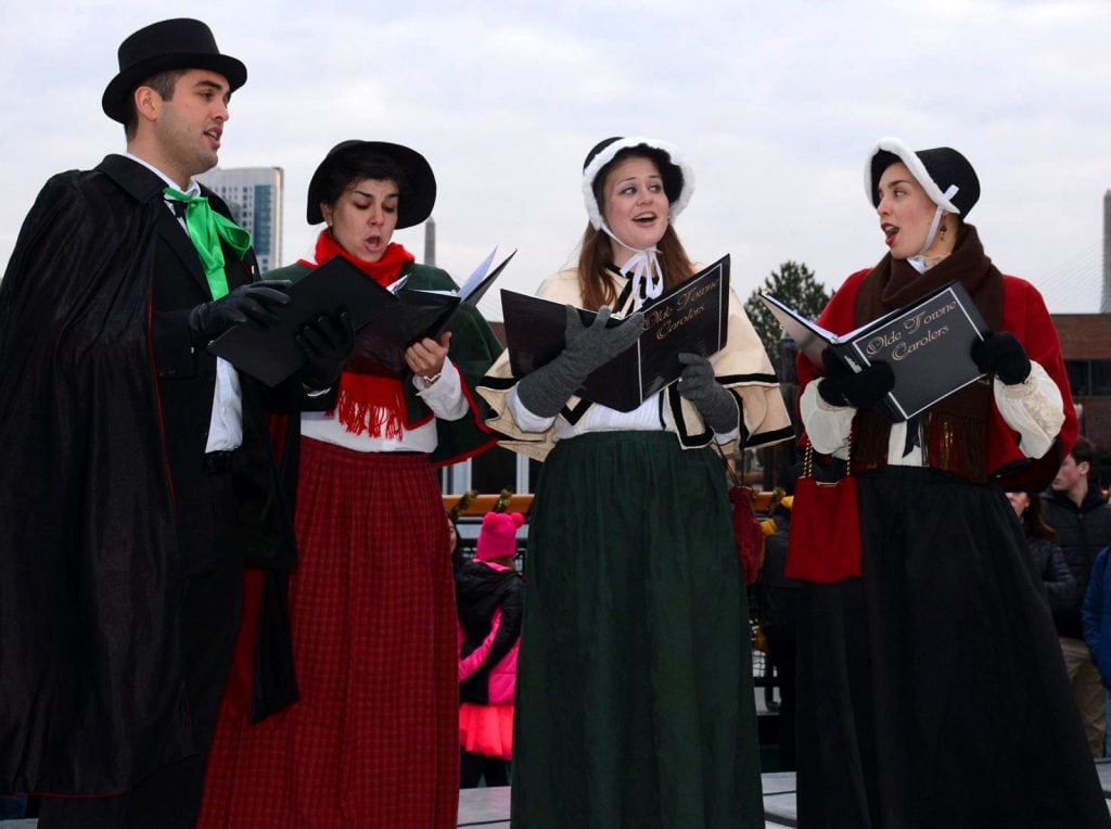 The carolers perform on the U.S.S. Constitution in Boston, MA.