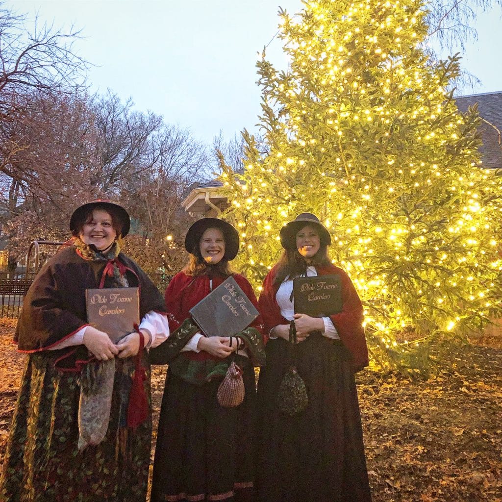 A trio of our ladies carol on Damen Avenue in Chicago, IL.