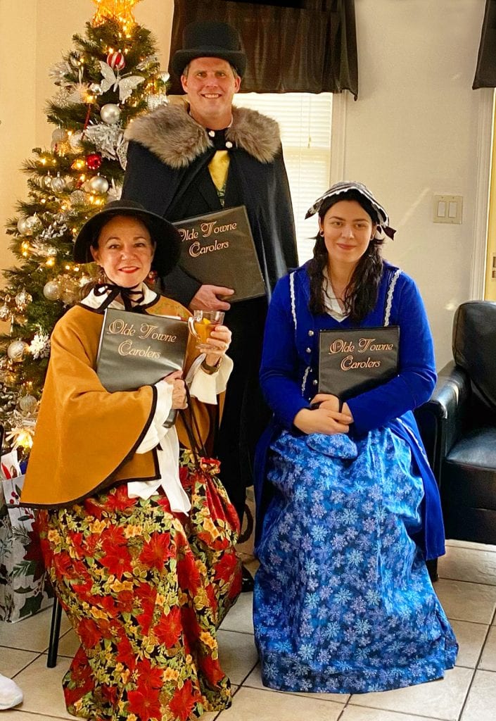 The carolers take a brief break during a performance at an assisted living facility in Cockeysville, MD.