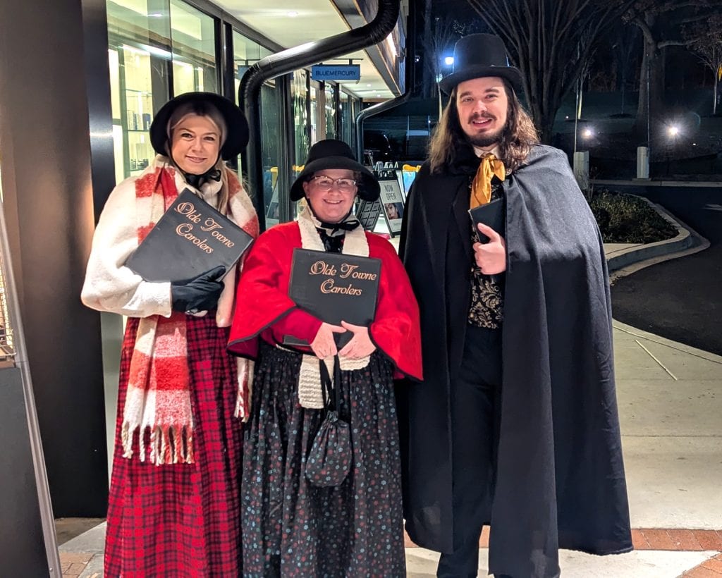 Anastasiia, Sarah, and Ben at a corporate holiday party in Baltimore, MD.