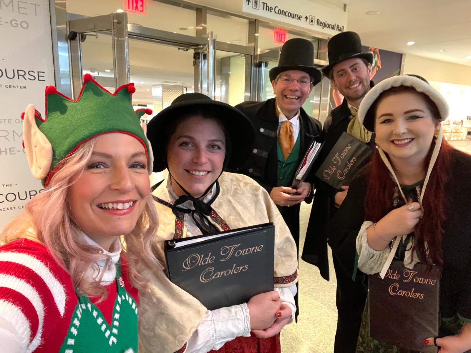 carolers and Christmas Elf at Comcast in Center City Philadelphia