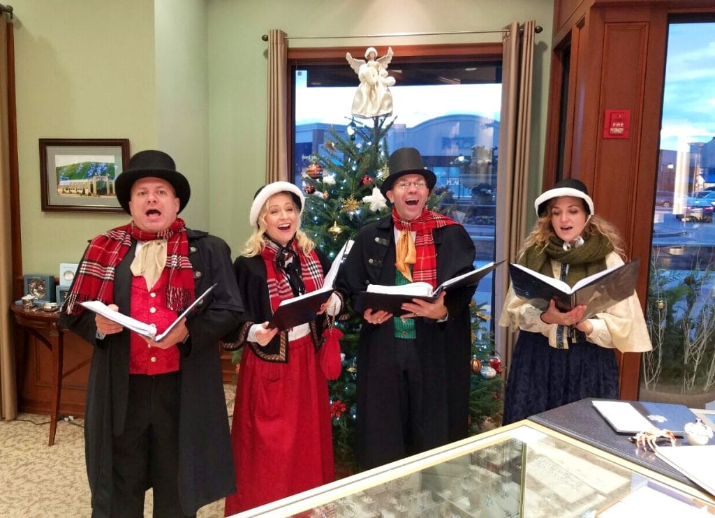 Matt, Jennifer, Chris, and Jamie Beth perform inside a store at the Promenade Saucon Valley.