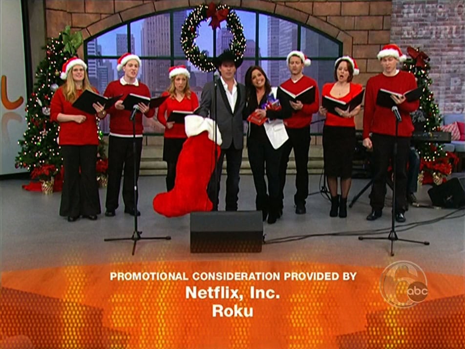 Olde Towne Carolers sings during the credits alongside Rachael and country musician Clay Walker.