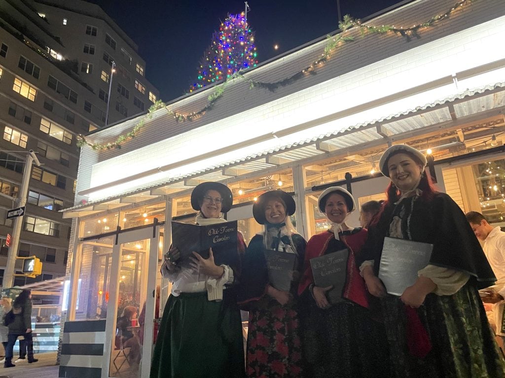 A quartet of our caroling ladies perform at Rosemary's, a popular Italian restaurant in Manhattan's West Village.