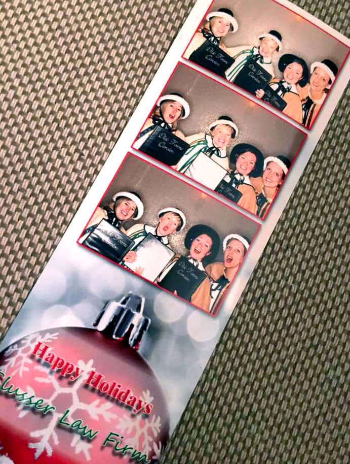 Stacy, Amy, Sara, and Eva take a few photo booth snaps during a Christmas party for Slusser Law Firm's 2017 Christmas party in Hazelton, PA.