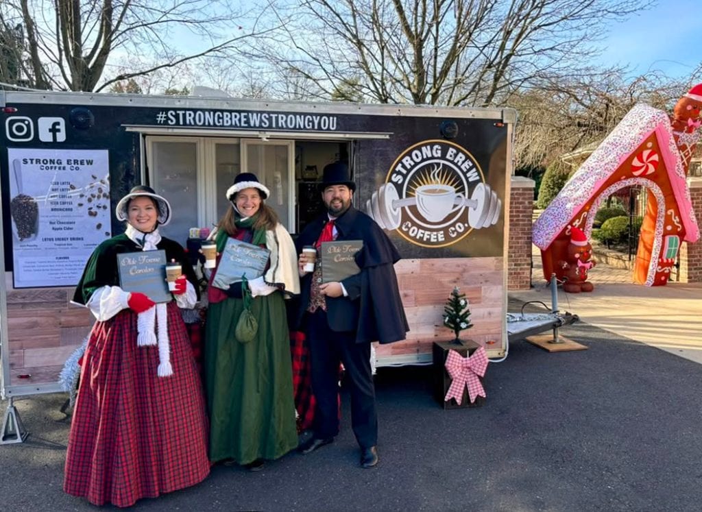 Gotta fuel up! The carolers grab a cup of joe at a private event in Philadelphia.